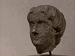 Escultura de Cleópatra. Apenas a cabeça.